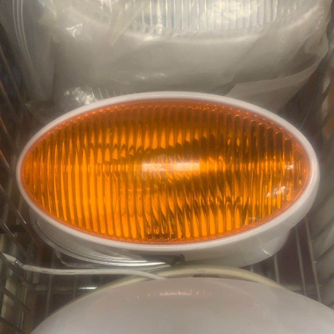 Young Farts RV Parts, Oval Orange lens Porch light white base